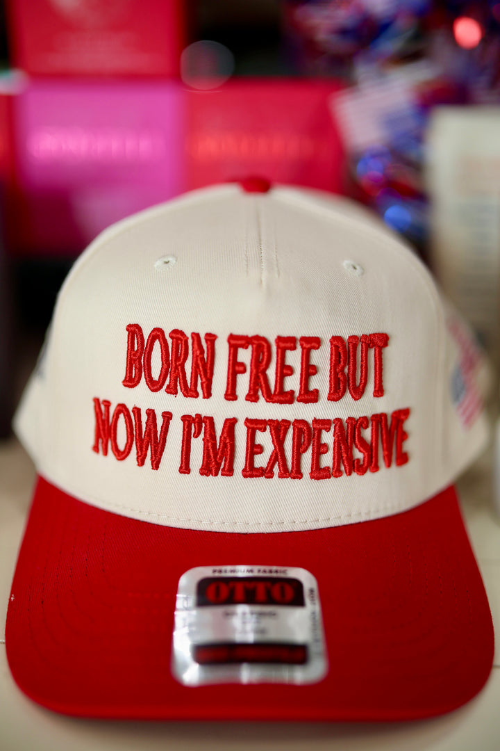 BORN FREE BUT NOW IM EXPENSIVE HAT